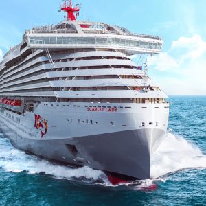 The Scarlet Lady sailing on the water from the front.